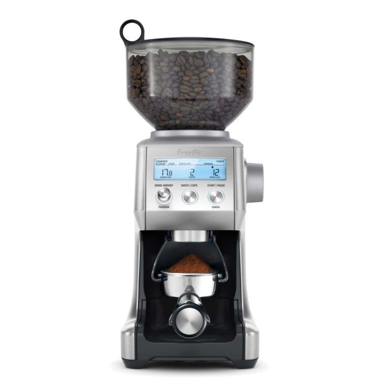 The Breville Smart Grinder Pro coffee grinder. Loaded with coffee beans and a ground filled portafilter.